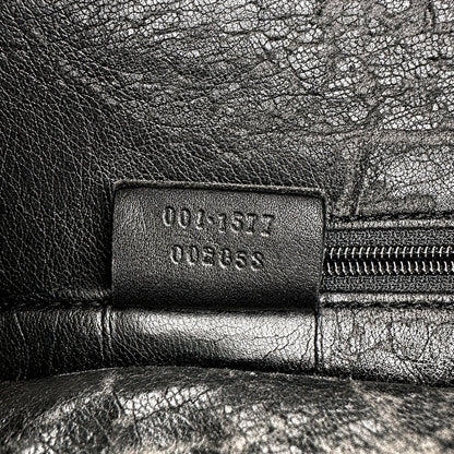 Gucci Bamboo Cuir Noir - détail de la patte de cuir intérieure portant la référence