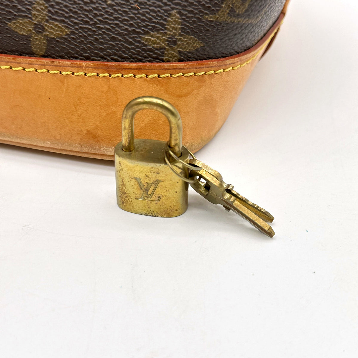 Louis Vuitton Alma Toile Monogram - cadenas et ses deux clés