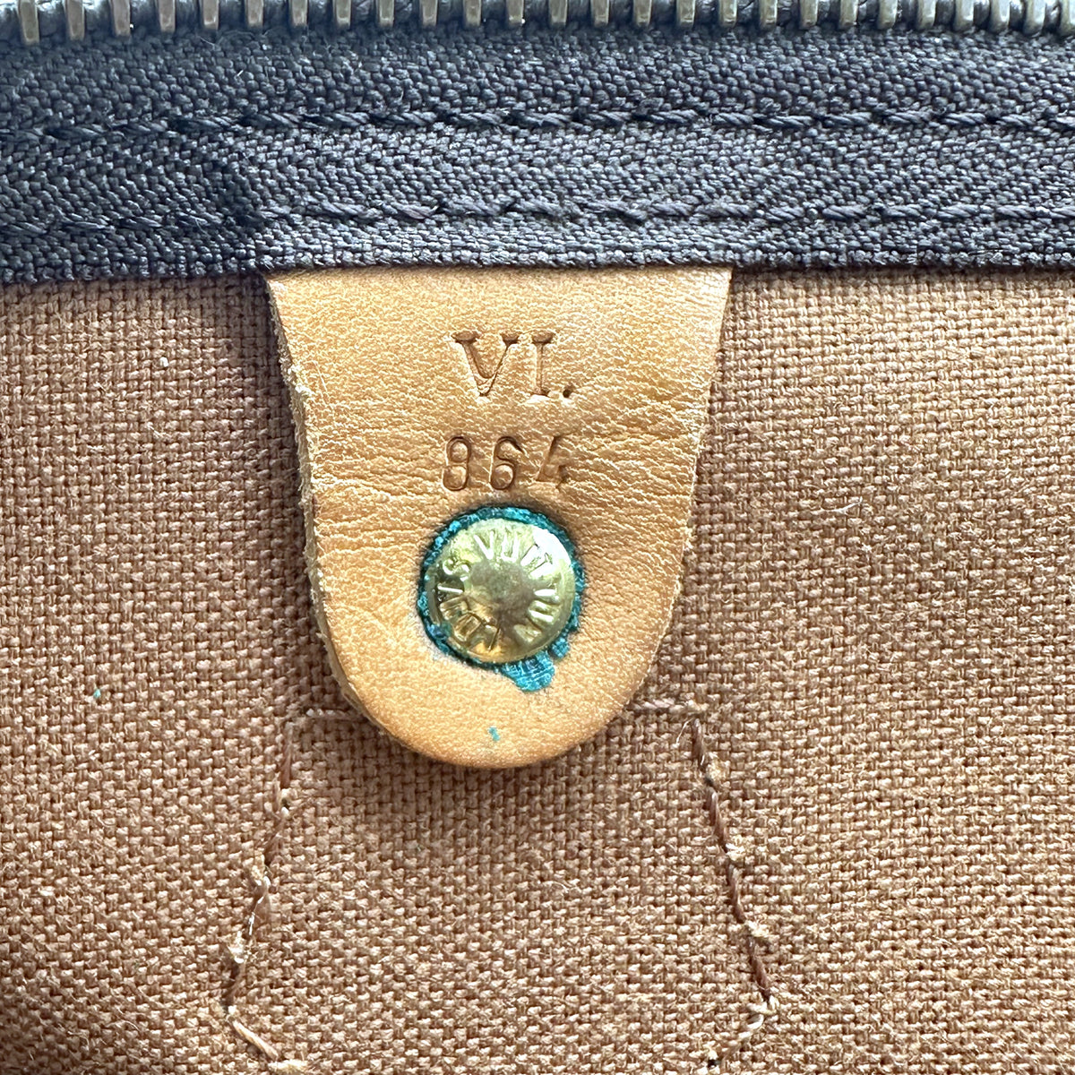Louis Vuitton Speedy 35 Toile Monogram - détail de la languette intérieure