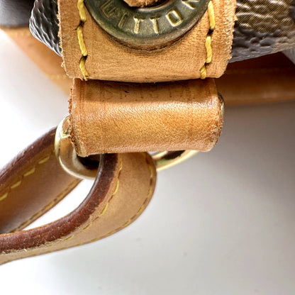 Louis Vuitton Grand Noé Toile Monogram - détail de l'attache en cuir naturel