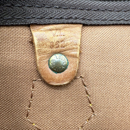 Louis Vuitton Speedy 40 Toile Monogram - détail de la doublure intérieure et de sa patte de cuir