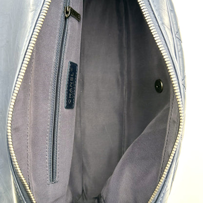 Chanel Matelassé Cuir Bleu Marine - intérieur ouvert, doublure grise et poche