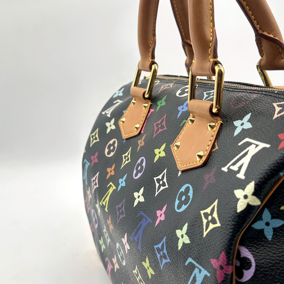 Louis Vuitton Speedy 30 Toile Monogram Multicolore Noir - détail des anses et de leurs attaches