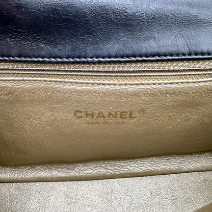 Chanel Single Flap Cuir d'agneau Noir - détail de l'estampille intérieure