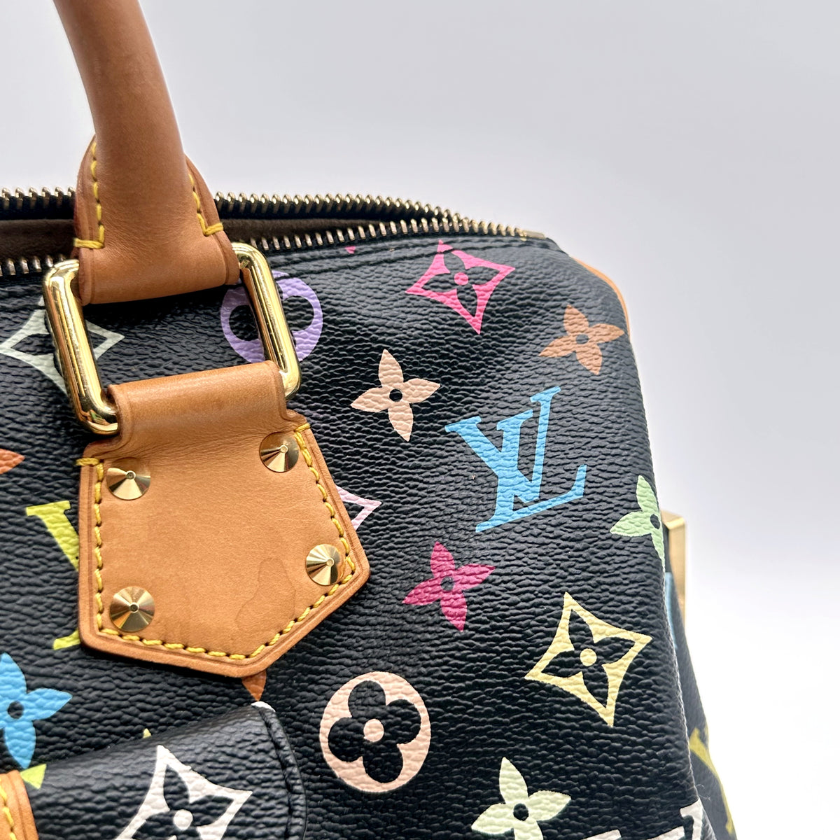 Louis Vuitton Speedy 30 Toile Monogram Multicolore Noir - détail d'une anse et du haut du sac