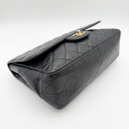 Chanel – Timeless Jumbo Simple Flap 30 cm Cuir Caviar Noir Doré