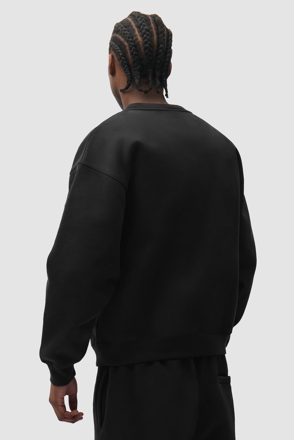 Sweat col rond Cor noir Arte Antwerp porté