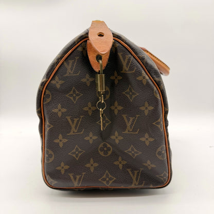Louis Vuitton Speedy 30 Toile Monogram - côté avec cadenas et clés