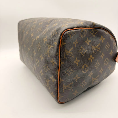 Louis Vuitton Speedy 30 toile Monogram - angle base et coin