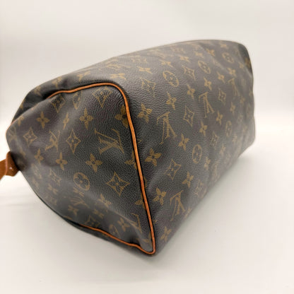 Louis Vuitton Speedy 30 toile Monogram - angle base et coin opposé