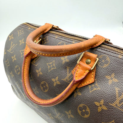 Louis Vuitton Speedy 30 - anses cuir naturel patine foncée détail