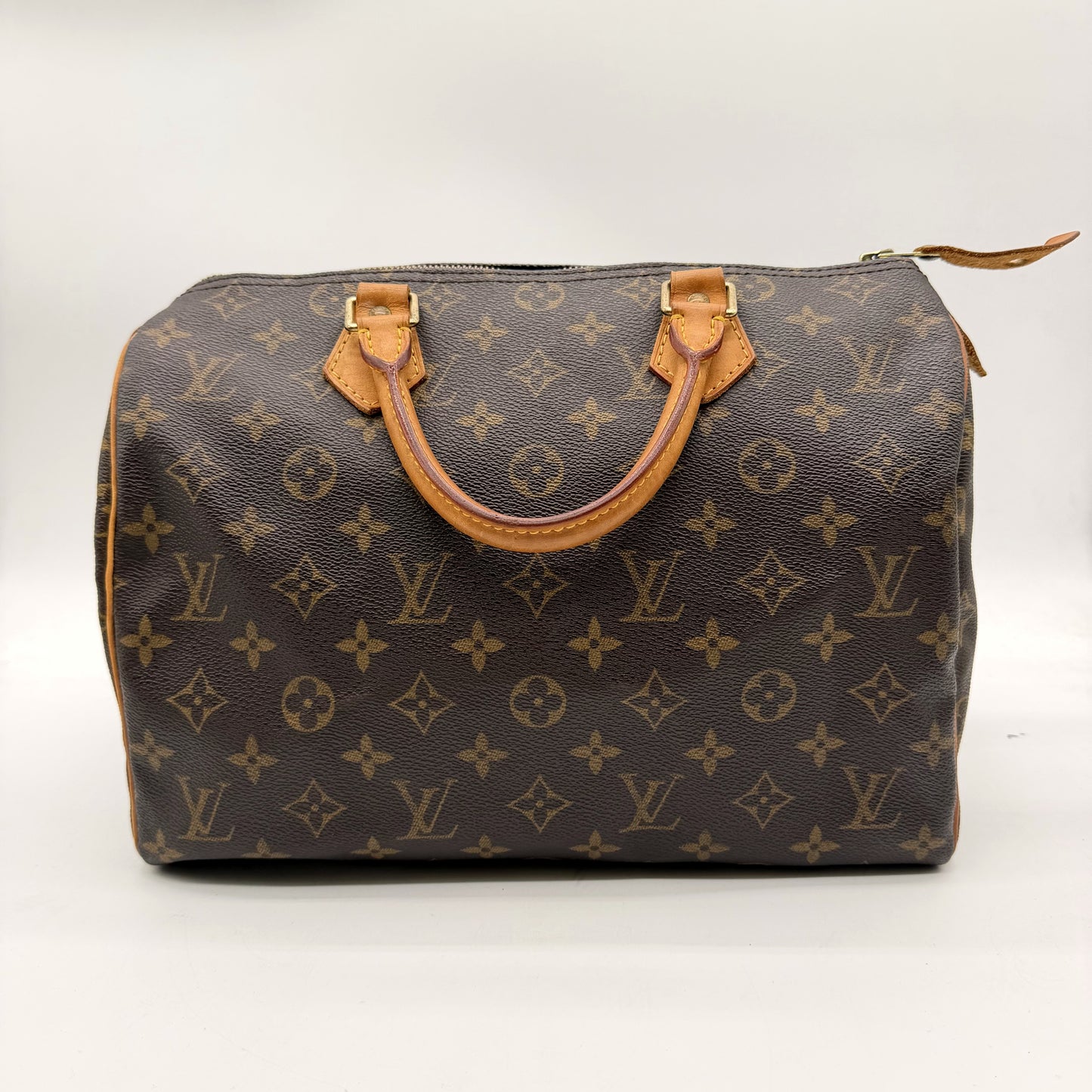 Louis Vuitton Speedy 30 Toile Monogram - vue avant, poignées cuir naturel