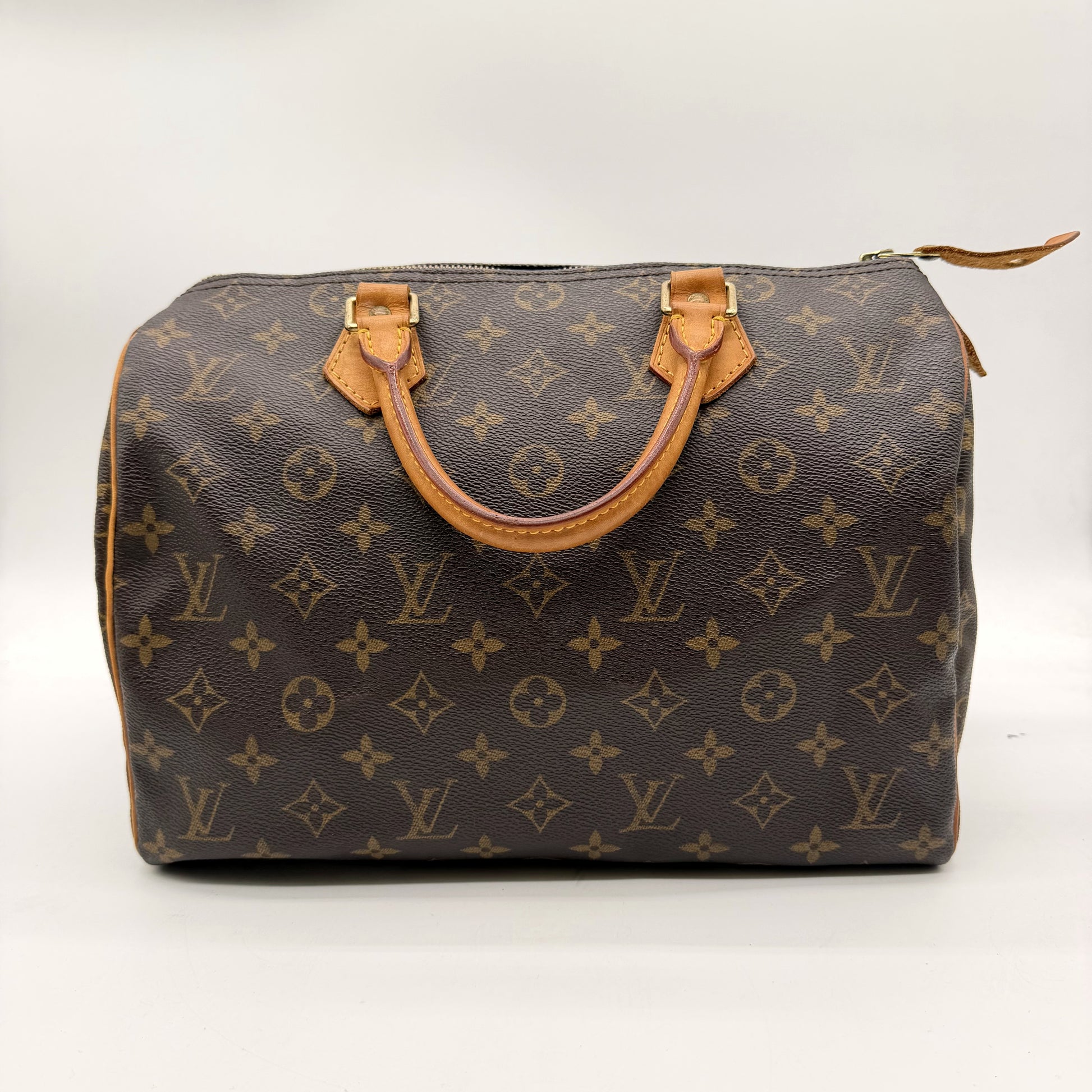 Louis Vuitton Speedy 30 Toile Monogram - vue avant, poignées cuir naturel
