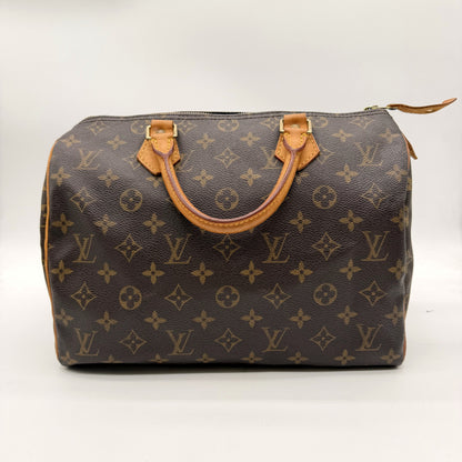 Louis Vuitton Speedy 30 Toile Monogram - vue avant, poignées cuir naturel