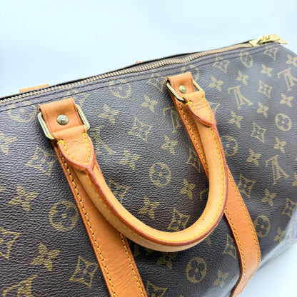 Louis Vuitton Keepall 45 Toile Monogram - détail anses cuir naturel patiné