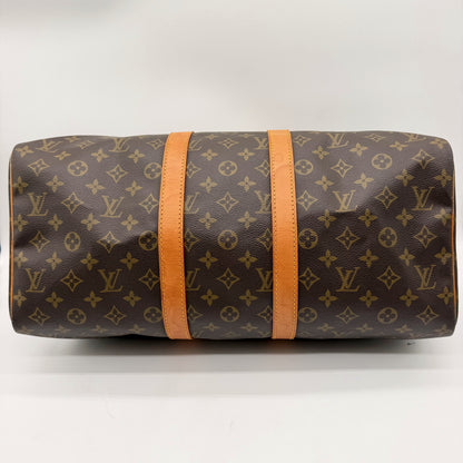 Louis Vuitton Keepall 45 Toile Monogram - vue de dessous avec bandes cuir