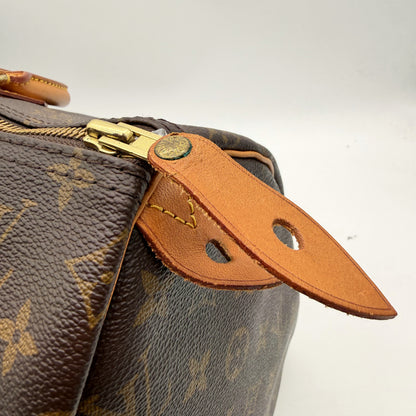 Louis Vuitton Speedy 40 - détail fermeture zip laiton doré et tirette cuir