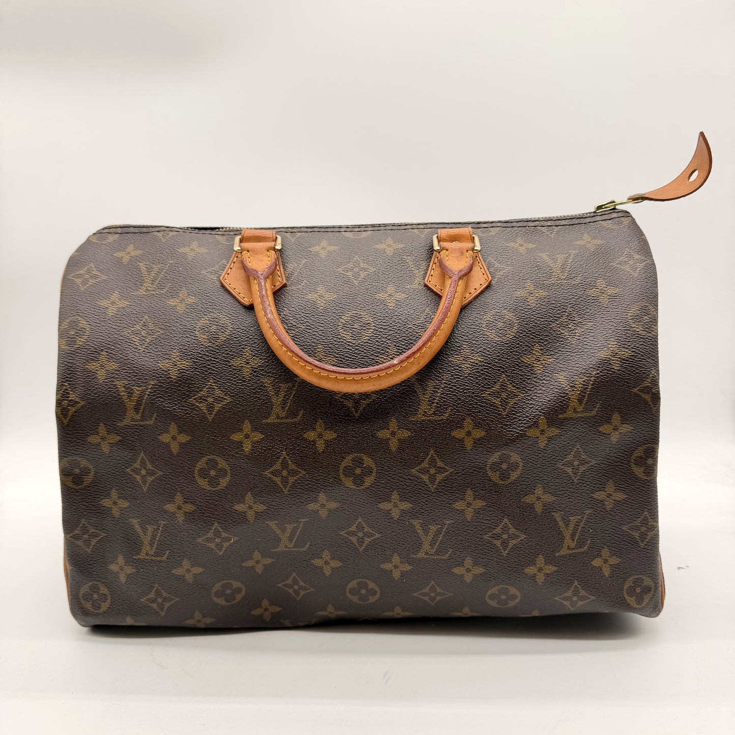 Louis Vuitton Speedy 35 Toile Monogram - vue avant, poignées cuir naturel patiné