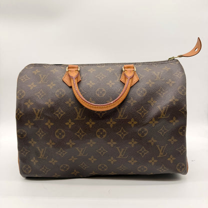 Louis Vuitton Speedy 35 Toile Monogram - vue avant, poignées cuir naturel patiné