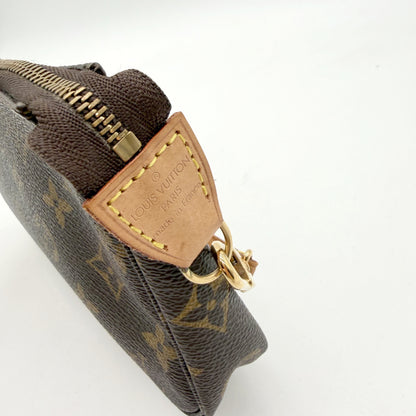 Louis Vuitton Pochette Accessoires Monogram - profil et patte de cuir latérale