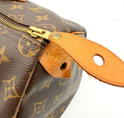 Louis Vuitton Speedy 35 Monogram - tirette zip et patte latérale